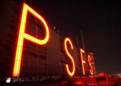 PSFS neon sign at night