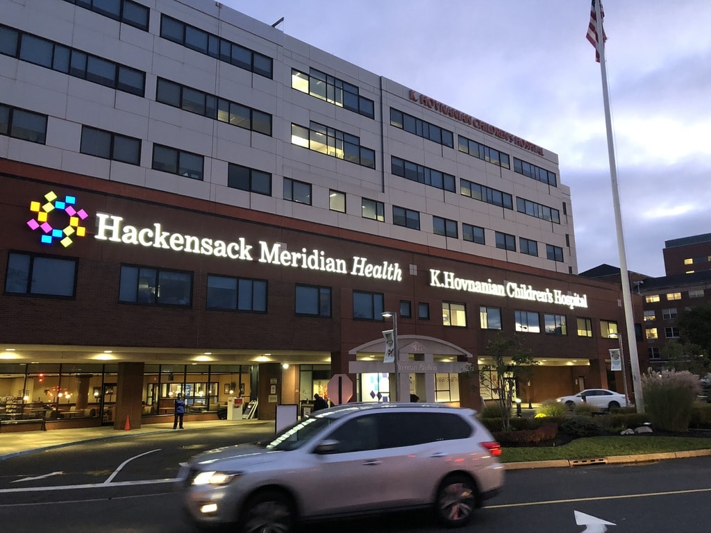 Hackensack Meridian Health Hospital Exterior Signs Illuminated at Night